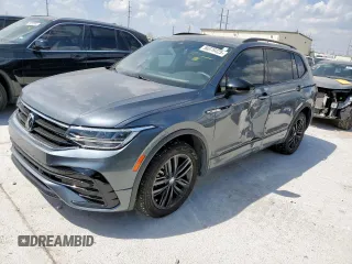 2022 Volkswagen Tiguan SE R-Line Black with VIN 3VVCB7AX6NM065002, listed as a Copart auction lot 50376425 with 30,408 mi miles and Salvage Title. Bid and sale history available at DreamBid. Image 1.