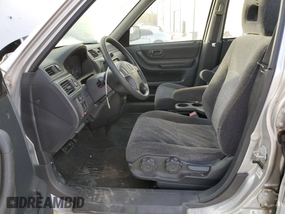1999 Honda CR-V LX with VIN JHLRD2844XC016583, listed as a Copart auction lot 73747274 with 104,730 mi miles and Salvage Title. Bid and sale history available at carsss.com. Image 7.