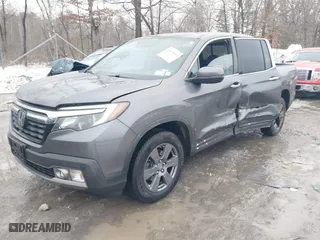 2020 Honda Ridgeline RTL-E with VIN 5FPYK3F70LB015422, listed as a IAAI auction lot 41578369 with 78,860 mi miles. Bid and sale history available at carsss.com. Image 2.