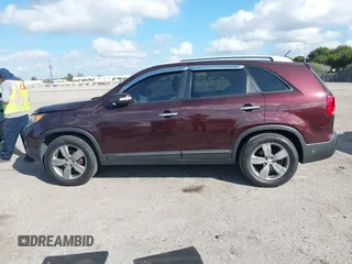 2012 Kia Sorento EX with VIN 5XYKU3A67CG224950, listed as a IAAI auction lot 41523784 with 113,930 mi miles. Bid and sale history available at carsss.com. Image 14.