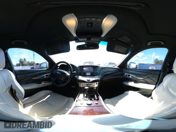 2013 Infiniti M with VIN JN1BY1AP0DM513527, listed as a IAAI auction lot 42170513 with 194,908 mi miles and . Bid and sale history available at DreamBid. Image 22.
