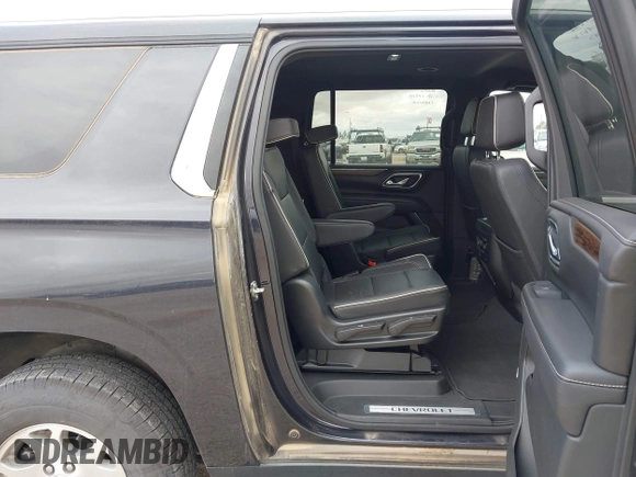 2023 Chevrolet Suburban Premier z VIN 1GNSKFKD2PR266705, wystawiony jako IAAI lot #42578313 z przebiegiem Nie podano mil oraz . Historia ofert i sprzedaży dostępna na DreamBid. Obrazek 8.