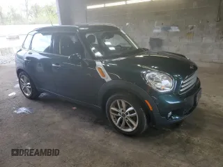 2014 MINI Countryman with VIN WMWZB3C58EWR37237, listed as a Copart auction lot 55596935 with 127,458 mi miles and Salvage Title. Bid and sale history available at DreamBid. Image 4.