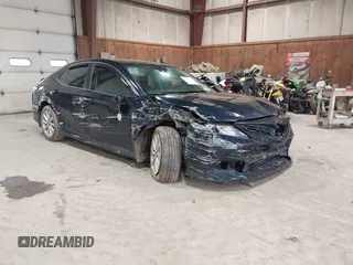2019 Toyota Camry LE z VIN 4T1B11HK8KU709218, wystawiony jako IAAI lot #42276742 z przebiegiem 74 640 mil mil oraz . Historia ofert i sprzedaży dostępna na DreamBid. Obrazek 1.