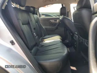 2014 Infiniti QX70 with VIN JN8CS1MW8EM411680, listed as a Copart auction lot 60350065 with 124,245 mi miles and Salvage title. Bid and sale history available at DreamBid. Image 11.