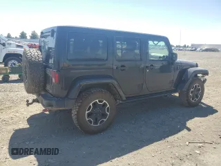 2014 Jeep Wrangler Unlimited Rubicon с VIN 1C4BJWFG7EL119344, выставлен на аукционе Copart как лот 65652265 с пробегом 150 934 миль миль и Списание • Salvage title. История ставок и продаж доступна на DreamBid. Изображение 3.