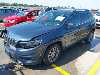 2019 Jeep Cherokee Latitude Plus with VIN 1C4PJLLX9KD469704, listed as a IAAI auction lot 42257879 with 90,917 mi miles and . Bid and sale history available at DreamBid. Image 2.