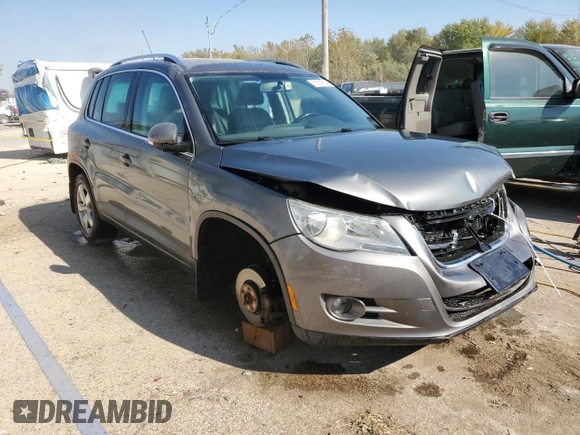 2010 Volkswagen Tiguan SEL with VIN WVGBV7AX2AW528700, listed as a Copart auction lot 76554624 with 134,566 mi miles and Salvage Title. Bid and sale history available at DreamBid. Image 4.