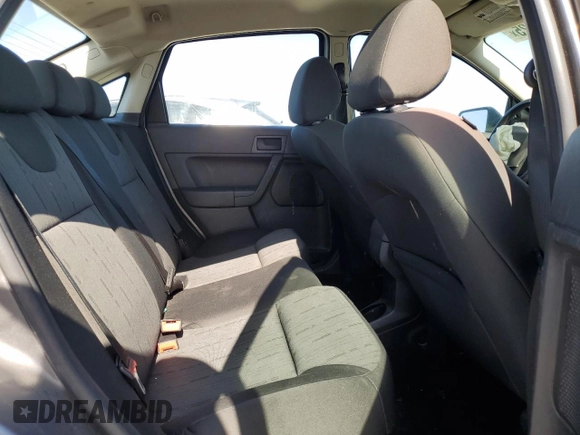 2009 Ford Focus SE z VIN 1FAHP35N59W148326, wystawiony jako Copart lot #57688025 z przebiegiem Nie podano mil oraz Szkoda całkowita • Salvage title. Historia ofert i sprzedaży dostępna na DreamBid. Obrazek 10.