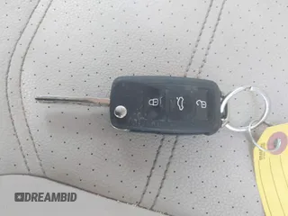 2013 Volkswagen Passat SE z VIN 1VWBN7A37DC059916, wystawiony jako IAAI lot #41638660 z przebiegiem 97 714 mil mil oraz . Historia ofert i sprzedaży dostępna na DreamBid. Obrazek 11.