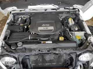 2015 Jeep Wrangler Unlimited Altitude с VIN 1C4HJWEG3FL559879, выставлен на аукционе Copart как лот 61054505 с пробегом 100 123 миль миль и На запчасти • Non repairable. История ставок и продаж доступна на DreamBid. Изображение 12.