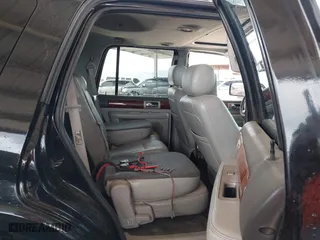 2004 Lincoln Navigator Luxury with VIN 5LMFU27R04LJ16634, listed as a IAAI auction lot 41922950 with 125,080 mi miles. Bid and sale history available at carsss.com. Image 8.