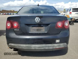 2009 Volkswagen Jetta GLI z VIN 3VWBJ71K19M071374, wystawiony jako Copart lot #77714284 z przebiegiem 61 434 mil mil oraz Szkoda całkowita • Salvage title. Historia ofert i sprzedaży dostępna na DreamBid. Obrazek 6.
