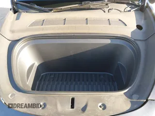 2024 Tesla Model Y with VIN 7SAYGDED5RF103983, listed as a IAAI auction lot 41933836 with 11,398 mi miles and . Bid and sale history available at DreamBid. Image 10.
