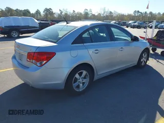 2014 Chevrolet Cruze 1LT with VIN 1G1PC5SB8E7201279, listed as a IAAI auction lot 41851574 with 125,806 mi miles and . Bid and sale history available at DreamBid. Image 4.