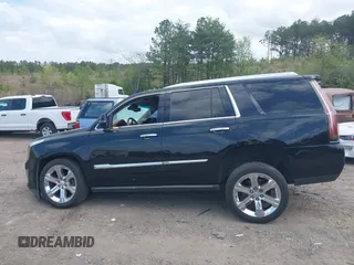2016 Cadillac Escalade Platinum z VIN 1GYS3DKJ7GR374845, wystawiony jako IAAI lot #41951693 z przebiegiem 93 820 mil mil oraz . Historia ofert i sprzedaży dostępna na DreamBid. Obrazek 14.
