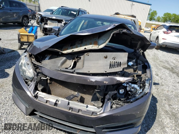 2018 Honda Civic EX with VIN 19XFC2F76JE027598, listed as a Copart auction lot 52301385 with 128,854 mi miles and Salvage Title. Bid and sale history available at DreamBid. Image 5.