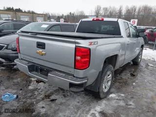 2018 Chevrolet Silverado 1500 LT with VIN 2GCVKREC5J1107722, listed as a IAAI auction lot 41695194 with 82,969 mi miles. Bid and sale history available at carsss.com. Image 4.