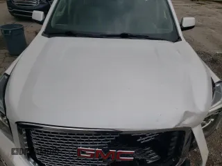 2016 GMC Yukon SLT with VIN 1GKS2BKC0GR265761, listed as a Copart auction lot 65645484 with 130,352 mi miles and Salvage Title. Bid and sale history available at carsss.com. Image 14.