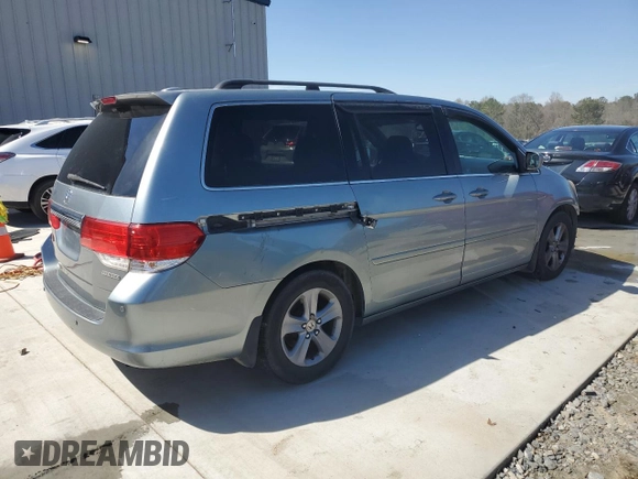 2010 Honda Odyssey Touring with VIN 5FNRL3H97AB096960, listed as a Copart auction lot 49291025 with 167,224 mi miles and Salvage Title. Bid and sale history available at carsss.com. Image 3.