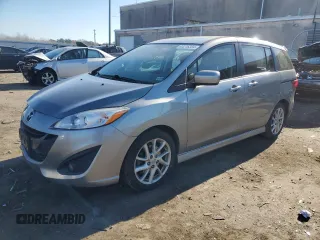 2012 Mazda 5 Touring with VIN JM1CW2CLXC0129834, listed as a Copart auction lot 83216334 with 111,802 mi miles and Salvage Title. Bid and sale history available at DreamBid. Image 1.