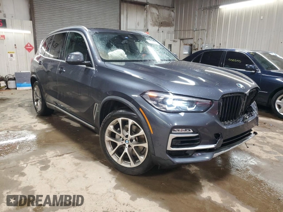 2021 BMW X5 xDrive40i with VIN 5UXCR6C00M9G00599, listed as a Copart auction lot 51536795 with 55,422 mi miles and Salvage title. Bid and sale history available at DreamBid. Image 4.