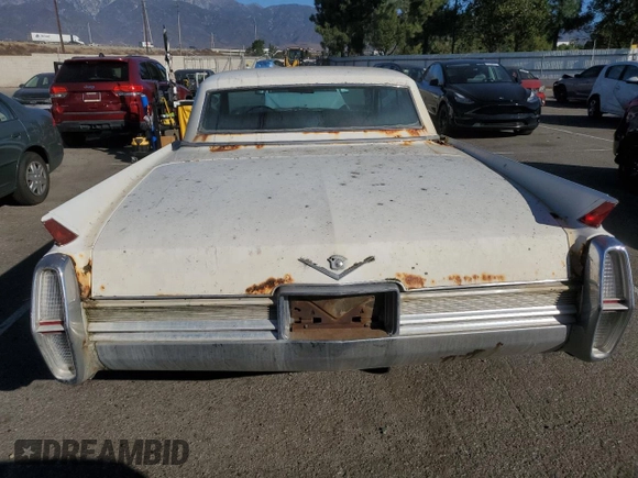 1964 Cadillac DeVille z VIN 64J117131, wystawiony jako Copart lot #79055844 z przebiegiem 75 803 mil mil oraz Czysty tytuł • Clean title. Historia ofert i sprzedaży dostępna na DreamBid. Obrazek 6.