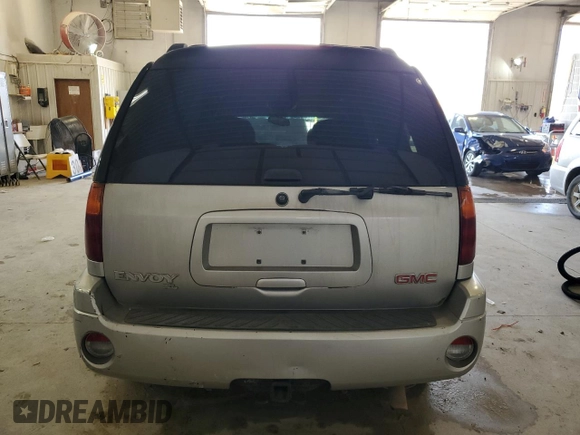 2004 GMC Envoy XL SLE with VIN 1GKET16S146120697, listed as a Copart auction lot 79917634 with 0 mi miles and Salvage Title. Bid and sale history available at carsss.com. Image 6.