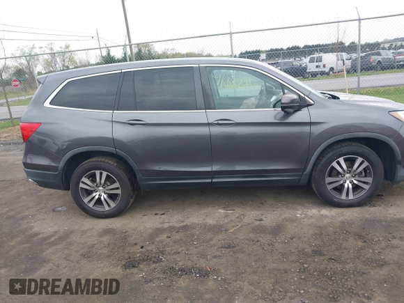 2017 Honda Pilot EX-L with VIN 5FNYF6H5XHB029443, listed as a IAAI auction lot 41992115 with 154,399 mi miles and . Bid and sale history available at DreamBid. Image 13.