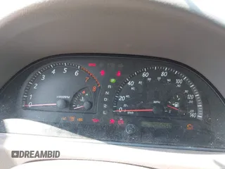 2002 Toyota Camry XLE z VIN 4T1BF30K22U007310, wystawiony jako IAAI lot #42419765 z przebiegiem 206 050 mil mil oraz . Historia ofert i sprzedaży dostępna na DreamBid. Obrazek 7.
