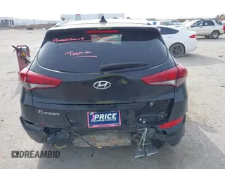 2018 Hyundai Tucson Sport with VIN KM8J33AL7JU772152, listed as a IAAI auction lot 41285203 with 87,188 mi miles. Bid and sale history available at carsss.com. Image 16.