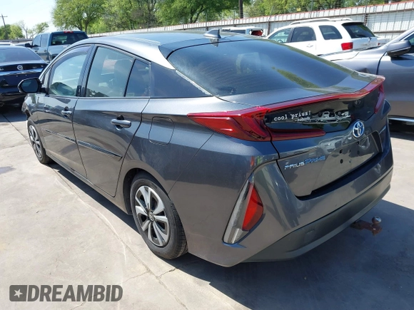 2018 Toyota Prius Plus with VIN JTDKARFP0J3101473, listed as a IAAI auction lot 41857956 with 110,020 mi miles and . Bid and sale history available at DreamBid. Image 3.