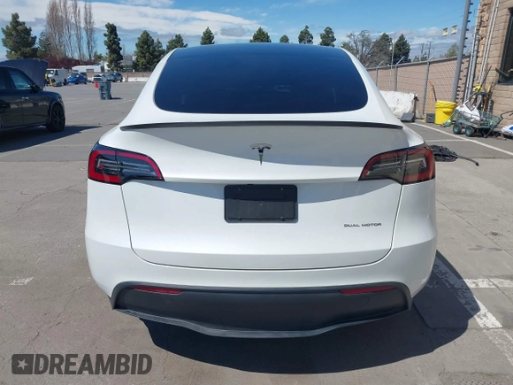 2023 Tesla Model Y Long Range with VIN 7SAYGDEE2PF696336, listed as a IAAI auction lot 41894686 with 34,203 mi miles. Bid and sale history available at carsss.com. Image 16.