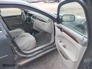 2011 Buick Lucerne CX with VIN 1G4HA5EMXBU117486, listed as a IAAI auction lot 41981445 with 169,602 mi miles. Bid and sale history available at carsss.com. Image 5.