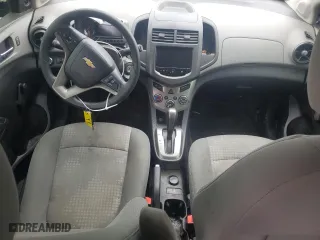 2014 Chevrolet Sonic LS with VIN 1G1JA6SH0E4101085, listed as a Copart auction lot 56472284 with 115,091 mi miles and Salvage Title. Bid and sale history available at carsss.com. Image 8.