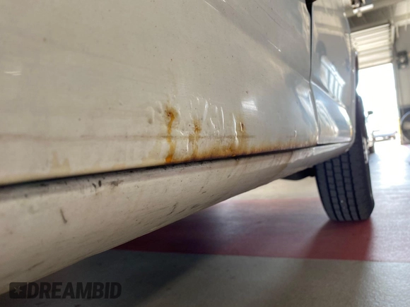 2014 Chevrolet Express Cargo with VIN 1GCWGFCA2E1184095, listed as a IAAI auction lot 42725036 with 270,636 mi miles and . Bid and sale history available at DreamBid. Image 26.