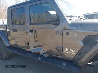 2021 Jeep Gladiator Overland z VIN 1C6HJTFG3ML588042, wystawiony jako IAAI lot #41730427 z przebiegiem 22 344 mil mil oraz . Historia ofert i sprzedaży dostępna na DreamBid. Obrazek 6.