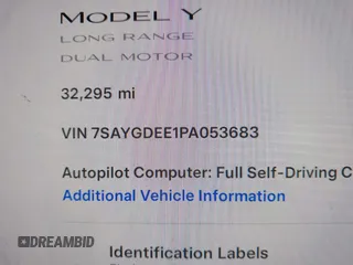 2023 Tesla Model Y Long Range with VIN 7SAYGDEE1PA053683, listed as a IAAI auction lot 42124517 with 32,295 mi miles. Bid and sale history available at carsss.com. Image 9.