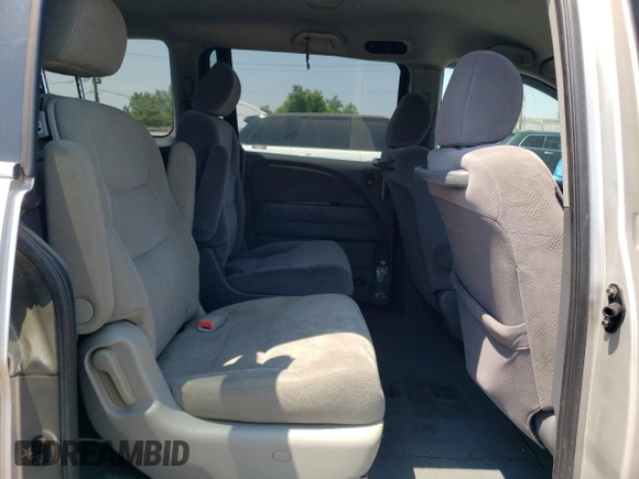 2007 Honda Odyssey LX with VIN 5FNRL38287B054504, listed as a Copart auction lot 59141665 with 128,617 mi miles and Salvage title. Bid and sale history available at DreamBid. Image 11.