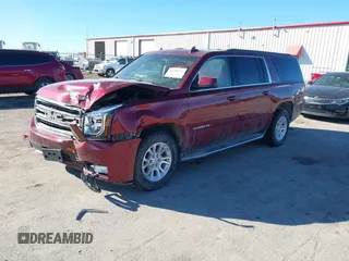 2019 GMC Yukon XL SLT with VIN 1GKS2GKC2KR343513, listed as a IAAI auction lot 41680722 with 116,518 mi miles and . Bid and sale history available at carsss.com. Image 2.