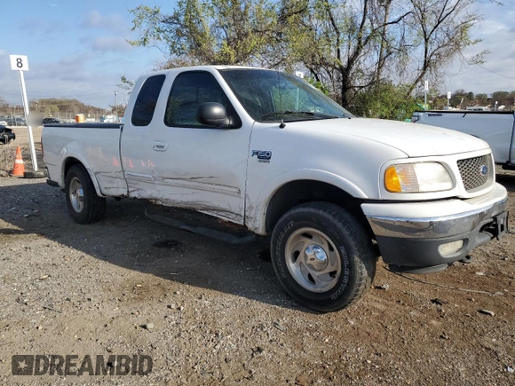 2000 Ford F-150 XL with VIN 2FTRX18L2YCA44464, listed as a Copart auction lot 51081335 with Not provided miles and Salvage title. Bid and sale history available at DreamBid. Image 4.