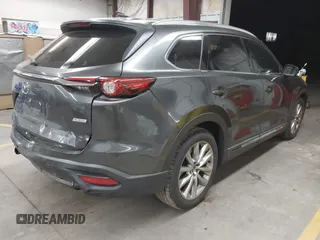 2017 Mazda CX-9 Grand Touring z VIN JM3TCADY2H0134070, wystawiony jako IAAI lot #41611243 z przebiegiem 87 046 mil mil oraz . Historia ofert i sprzedaży dostępna na DreamBid. Obrazek 4.