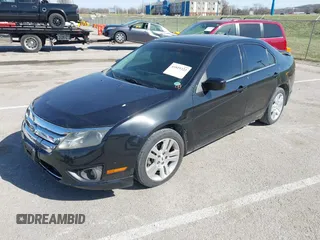 2011 Ford Fusion SE with VIN 3FAHP0HA8BR232236, listed as a IAAI auction lot 41819322 with 196,339 mi miles. Bid and sale history available at carsss.com. Image 2.
