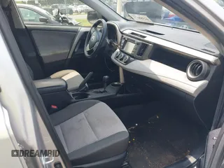 2015 Toyota RAV4 LE with VIN JTMBFREV6FJ039453, listed as a IAAI auction lot 42388671 with 200,304 mi miles and . Bid and sale history available at DreamBid. Image 5.