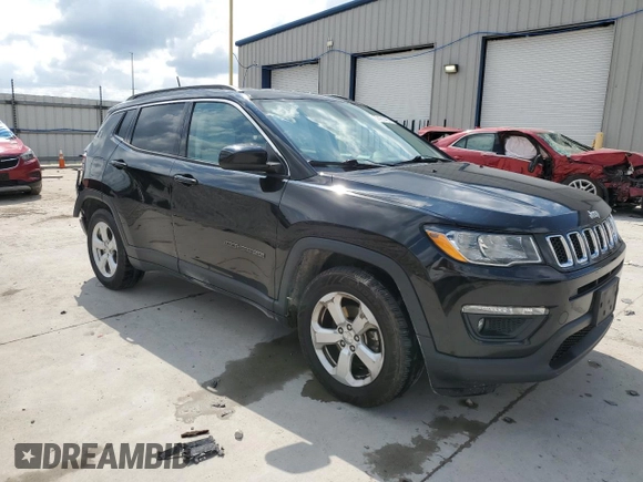 2017 Jeep Compass Latitude with VIN 3C4NJCBB0HT611440, listed as a Copart auction lot 57401485 with 128,319 mi miles and Salvage title. Bid and sale history available at DreamBid. Image 4.