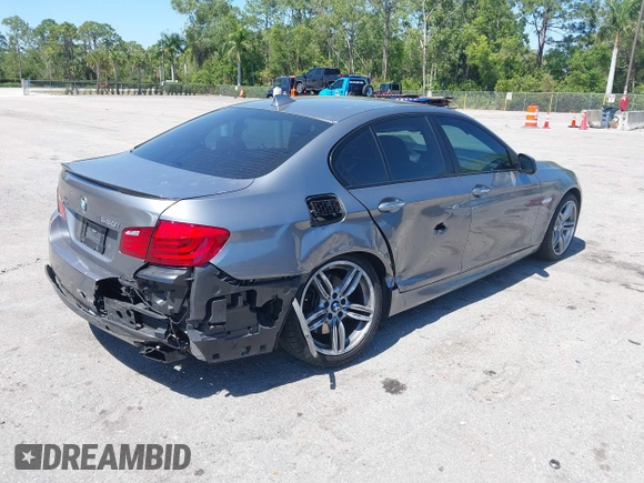 2013 BMW 5 Series 550i xDrive with VIN WBAFU9C54DDY72137, listed as a IAAI auction lot 41794124 with 58,647 mi miles and . Bid and sale history available at carsss.com. Image 4.