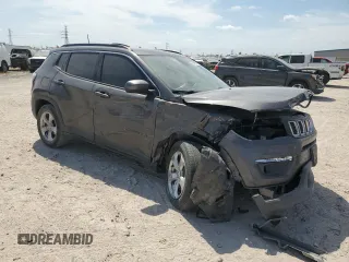 2021 Jeep Compass Latitude with VIN 3C4NJCBB0MT505824, listed as a Copart auction lot 53182825 with 124,628 mi miles and Salvage title. Bid and sale history available at DreamBid. Image 4.