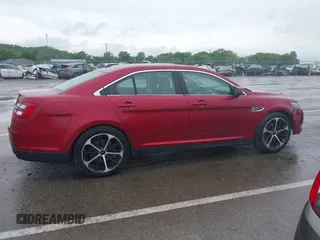 2014 Ford Taurus SEL z VIN 1FAHP2E83EG125622, wystawiony jako IAAI lot #42204238 z przebiegiem 134 032 mil mil oraz . Historia ofert i sprzedaży dostępna na DreamBid. Obrazek 14.