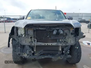 2017 Toyota Tacoma SR5 with VIN 5TFAZ5CN4HX047095, listed as a IAAI auction lot 41951364 with 127,706 mi miles and . Bid and sale history available at DreamBid. Image 13.