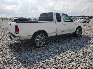 2002 Ford F-150 XL with VIN 1FTRX17272NB01218, listed as a Copart auction lot 61336795 with 201,972 mi miles and Salvage title. Bid and sale history available at DreamBid. Image 3.